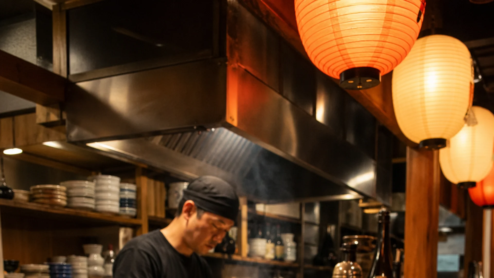 A wide-angle, photorealistic shot inside a warm-lit Tokyo izakaya , wooden counter seats, glowing paper lanterns, ceramic sake cups, and small plates of grilled skewers , no phone numbers or brand signage visible. Alt: best izakaya in Tokyo interior atmosphere with sake and yakitori.