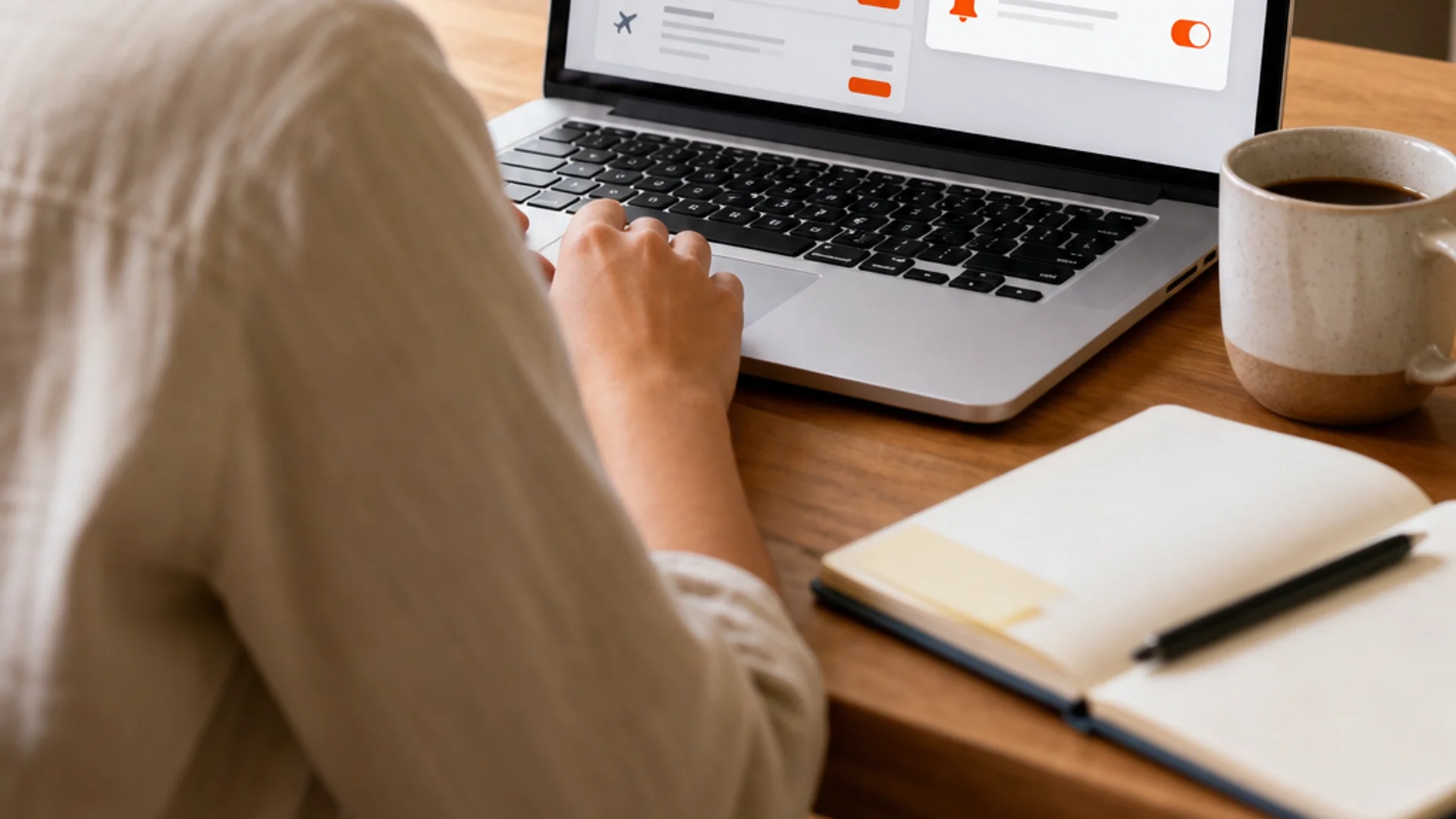 setting up flight price alerts for cheap flights to Europe on a laptop.