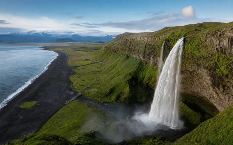 Iceland South Coast waterfall and black sand beach on a Ring Road road trip