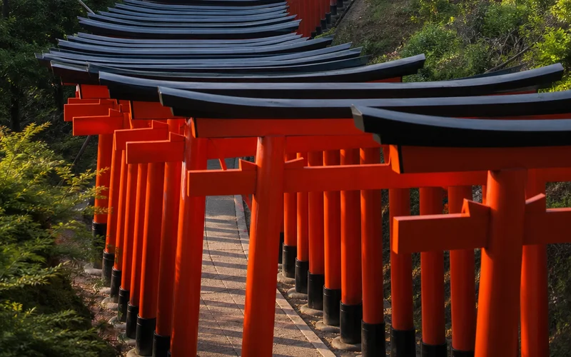 Fushimi Inari Shrine torii gates tunnel Kyoto.